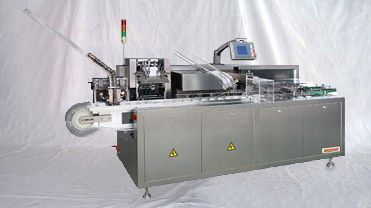 Oral liquid bottles feeding automated boxes cartoning packaging Botellas orales mquina de boxeo