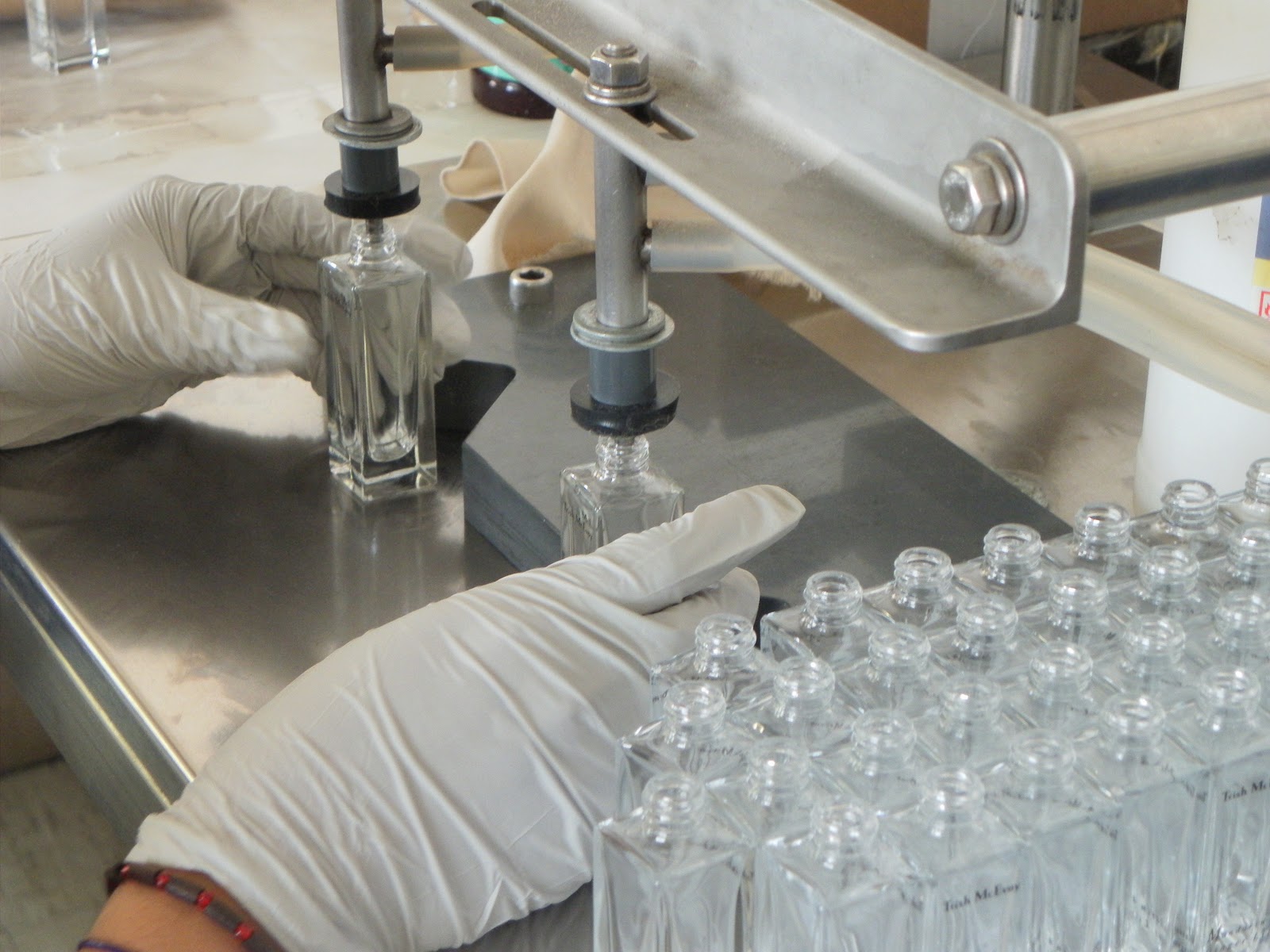 perfume bottles filling samples.JPG