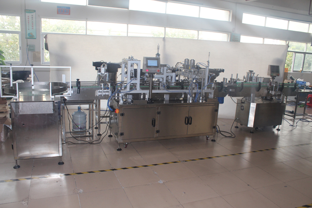 fully automatic perfume liquid freezing filter tank integrated with bottling cartoning overwrapper e